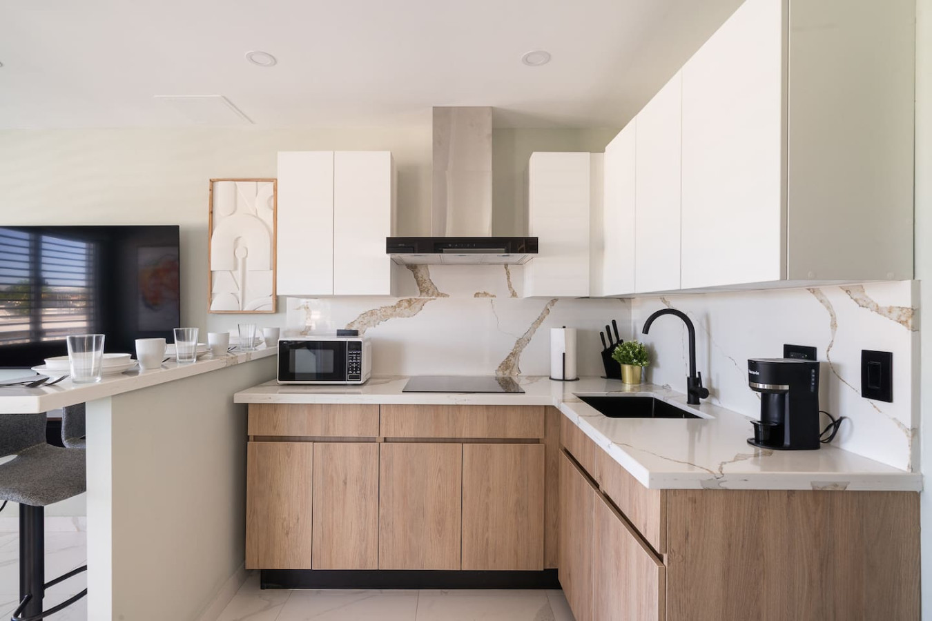 Kitchen with a microwave and a stove top oven — MoonJoy Chic 2BR Apartment Private Patio, Carolina