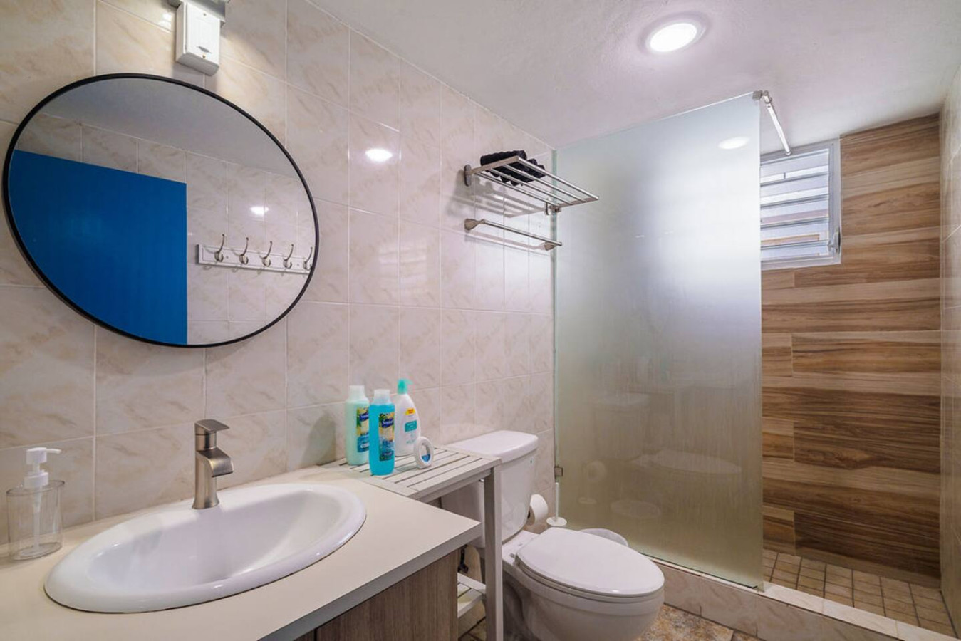 Bathroom with a white toilet and a sink — Walking to the Beach 3 bedroom House Next to Ocean, Luquillo