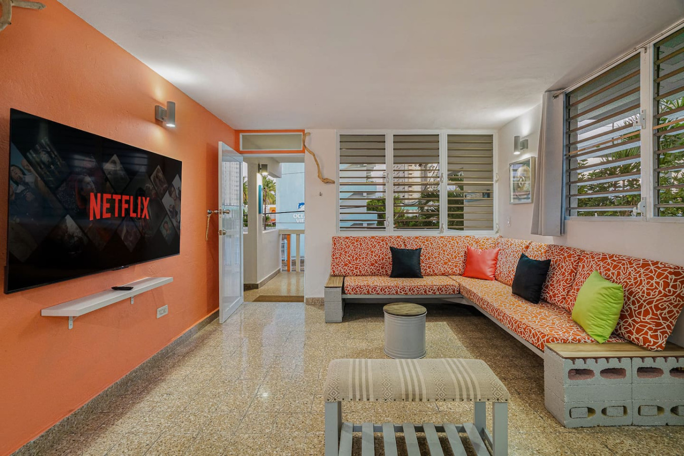 Living room with a couch and a flat screen TV — Walking to the Beach 3 bedroom House Next to Ocean, Luquillo
