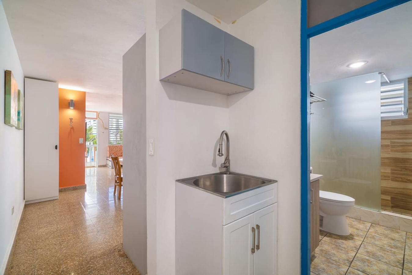 Hallway nook with a laundry tub — Walking to the Beach 3 bedroom House Next to Ocean, Luquillo