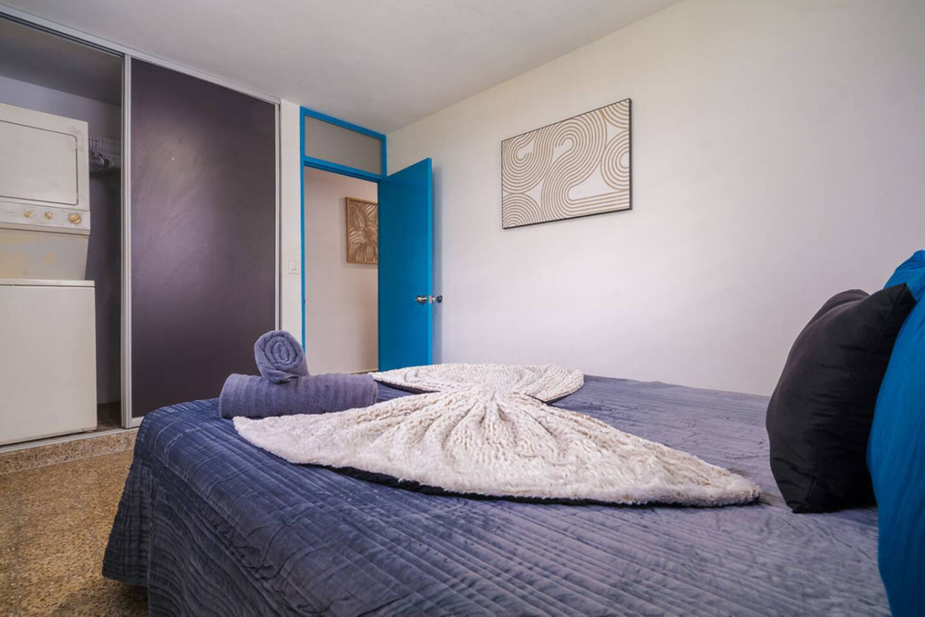 Bedroom with a blue bedspread and white sheets (bedroom 2) — Walking to the Beach 3 bedroom House Next to Ocean, Luquillo