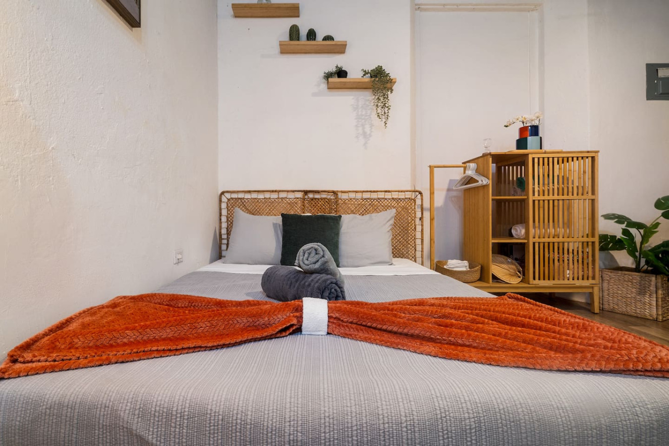 Bedroom with a bed and a blanket on it — Il Rifugio Nascosto | Somewhere In Heaven, Old San Juan