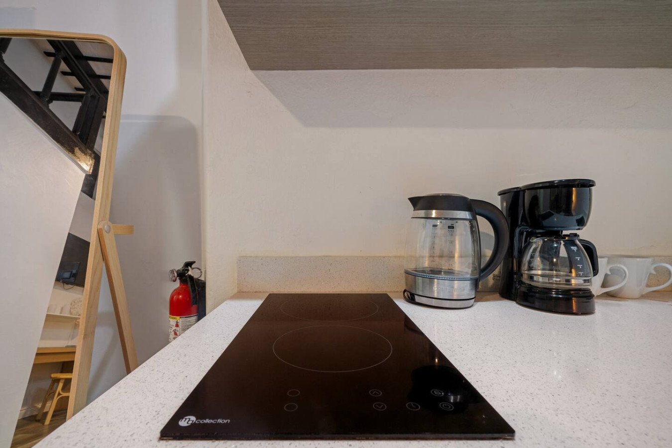Black stove top oven in a kitchen — Il Rifugio Nascosto | Somewhere In Heaven, Old San Juan