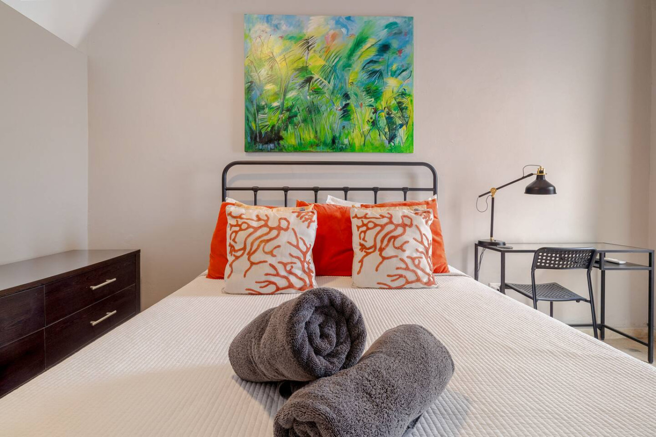 Bedroom with a bed and a painting on the wall — Historical Old SanJuan Spanish style private Patio, San Juan