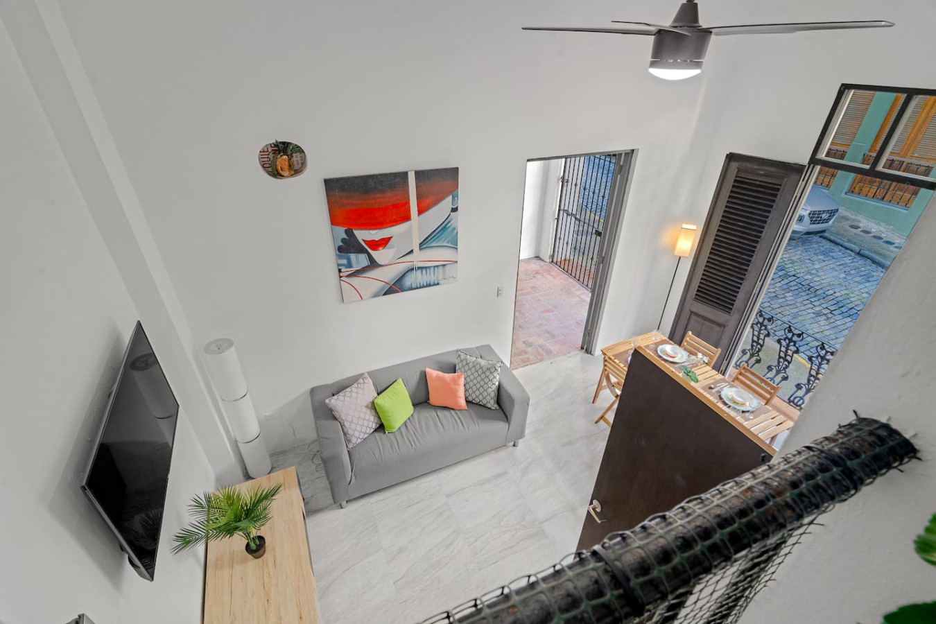 View of the ocean from the balcony of a vacation rental property in Puerto — El Balcón Art Loft – Old San Juan, Old San Juan