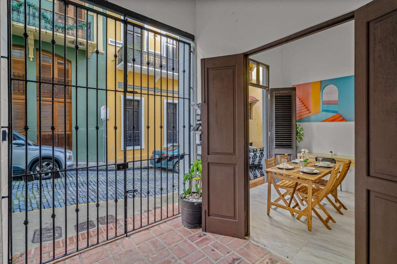 View of a yellow building with a balcony — El Balcón Art Loft – Old San Juan, Old San Juan