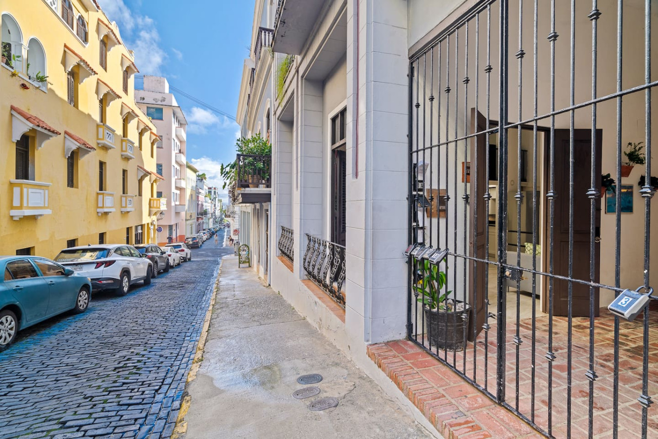 View of the street from the balcony of a vacation rental property in — El Balcón Art Loft – Old San Juan, Old San Juan