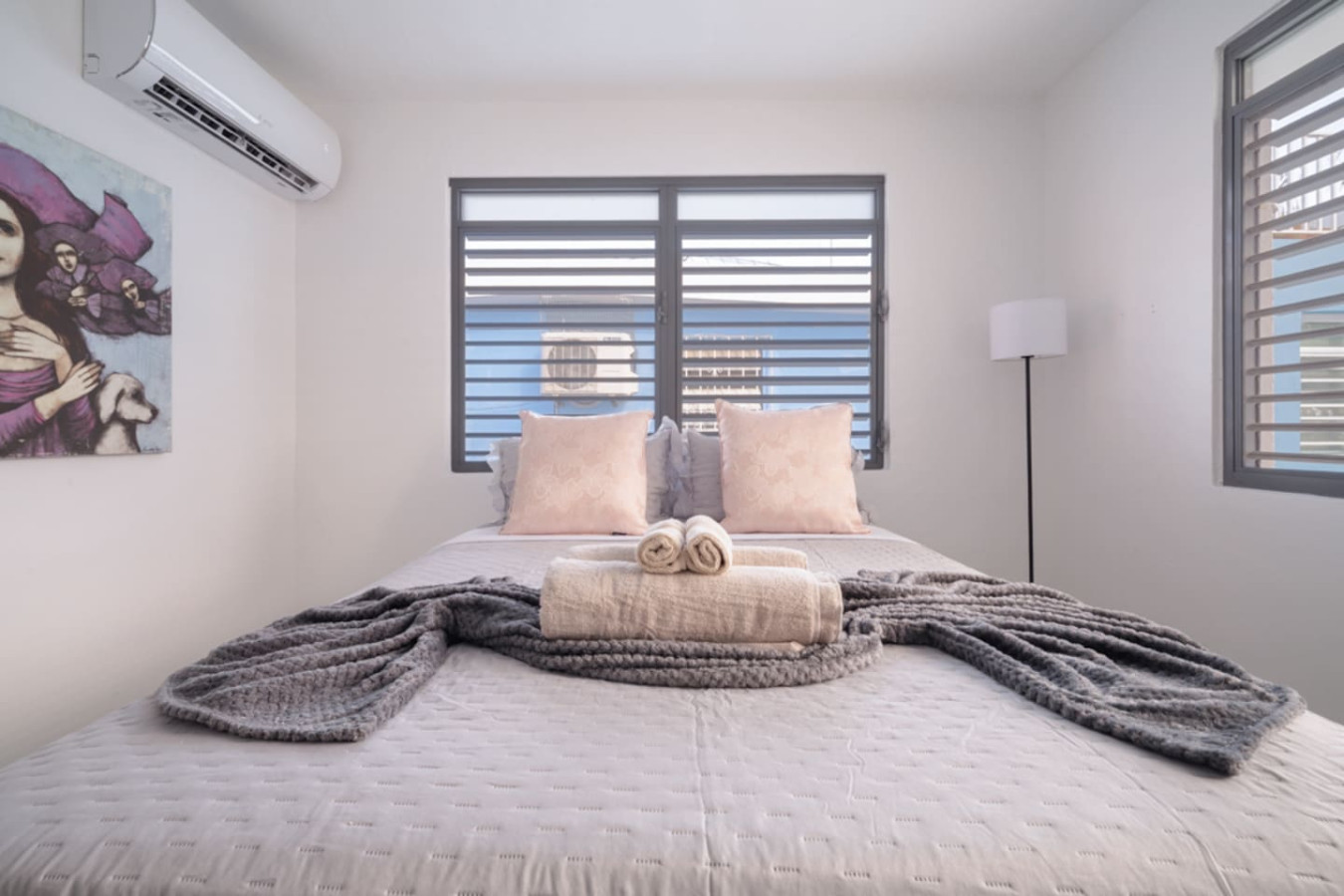 Bedroom with a large window and a view of the ocean — Casa Juno Grand Modern - 3 Bedroom - Walk to Beach, Santurce
