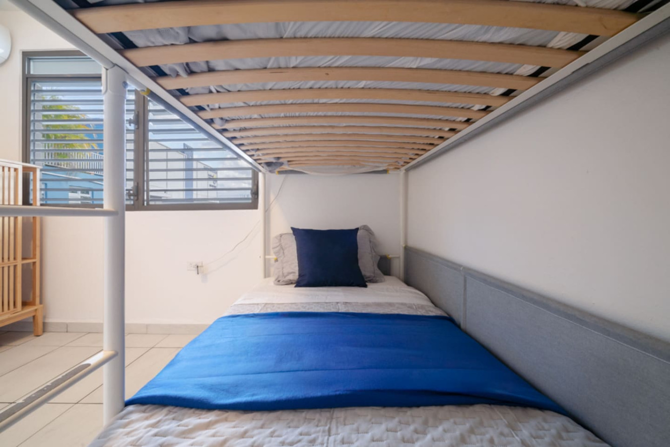 Bedroom with a blue bedspread and a blue pillow — Casa Juno Grand Modern - 3 Bedroom - Walk to Beach, Santurce