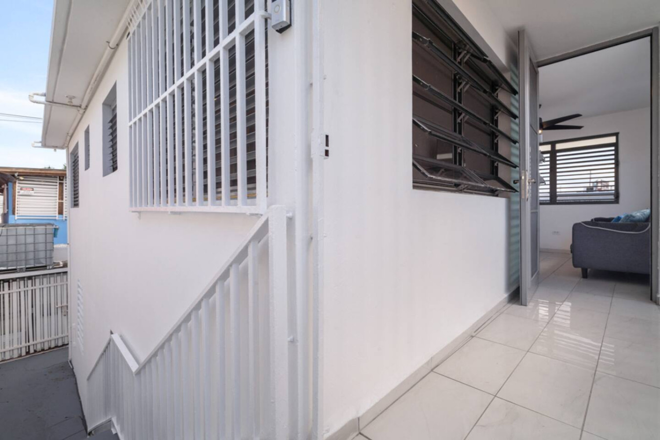 Outside stairs up to the second-floor entrance — Casa Juno Grand Modern - 3 Bedroom - Walk to Beach, Santurce