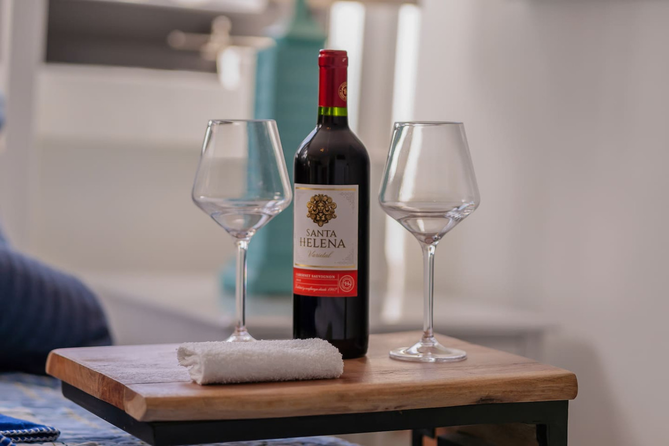 Bottle of Santa Helena wine on a table — Luxe Beachside Oasis: Pool Parking & Generator, Santurce