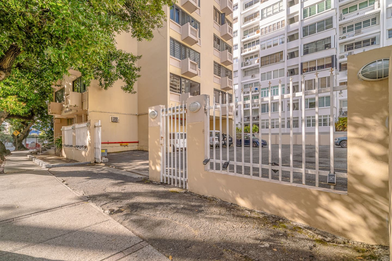 View of the street from the balcony — Luxe Beachside Oasis: Pool Parking & Generator, Santurce
