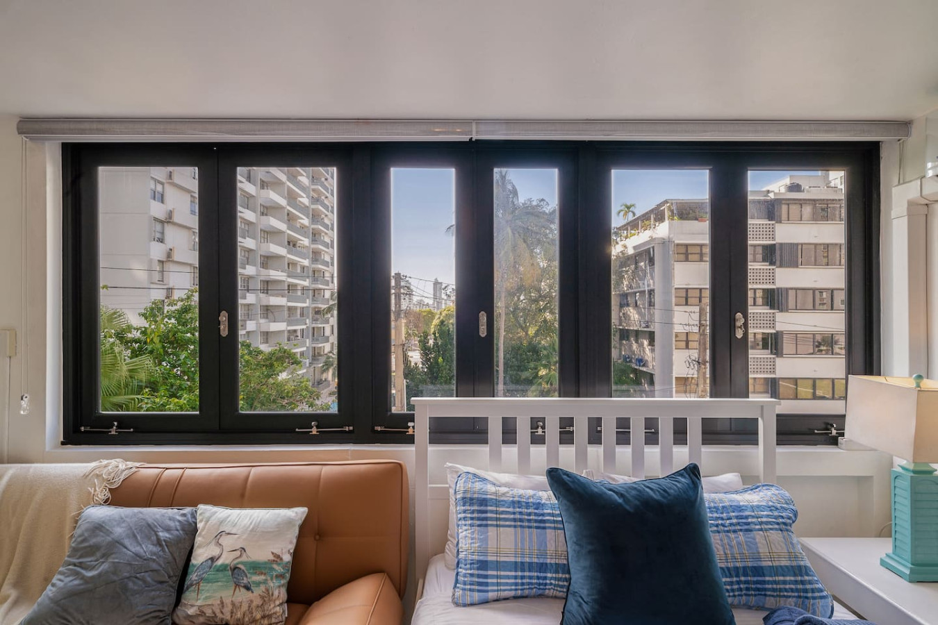 View of the city from the balcony — Luxe Beachside Oasis: Pool Parking & Generator, Santurce