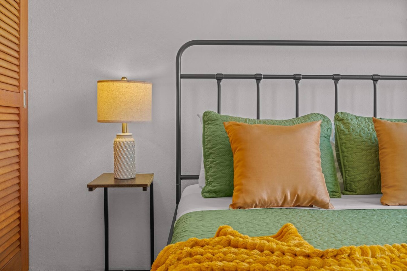 Bedroom with a bed and a lamp — The Galleria House | Private Patio Old San Juan, Old San Juan