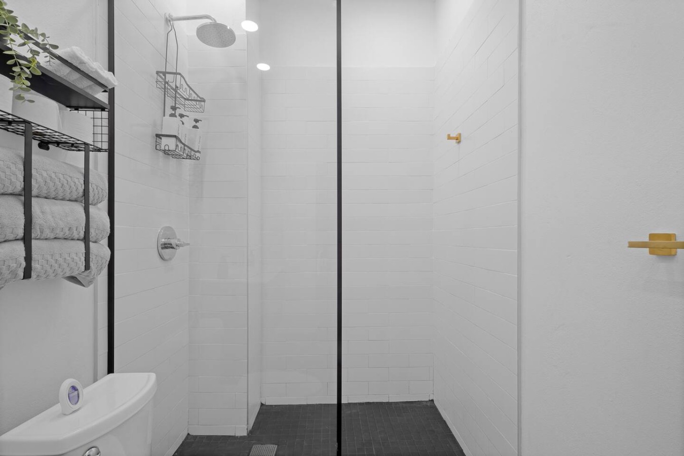 Bathroom with a rain shower and towel shelves — Bellavista Galleria | Old San Juan