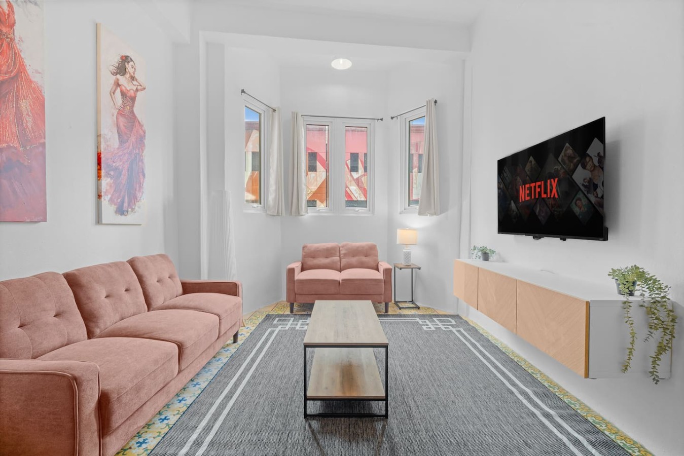 Living room with a couch and a flat screen TV — Bellavista Galleria | Old San Juan, Old San Juan
