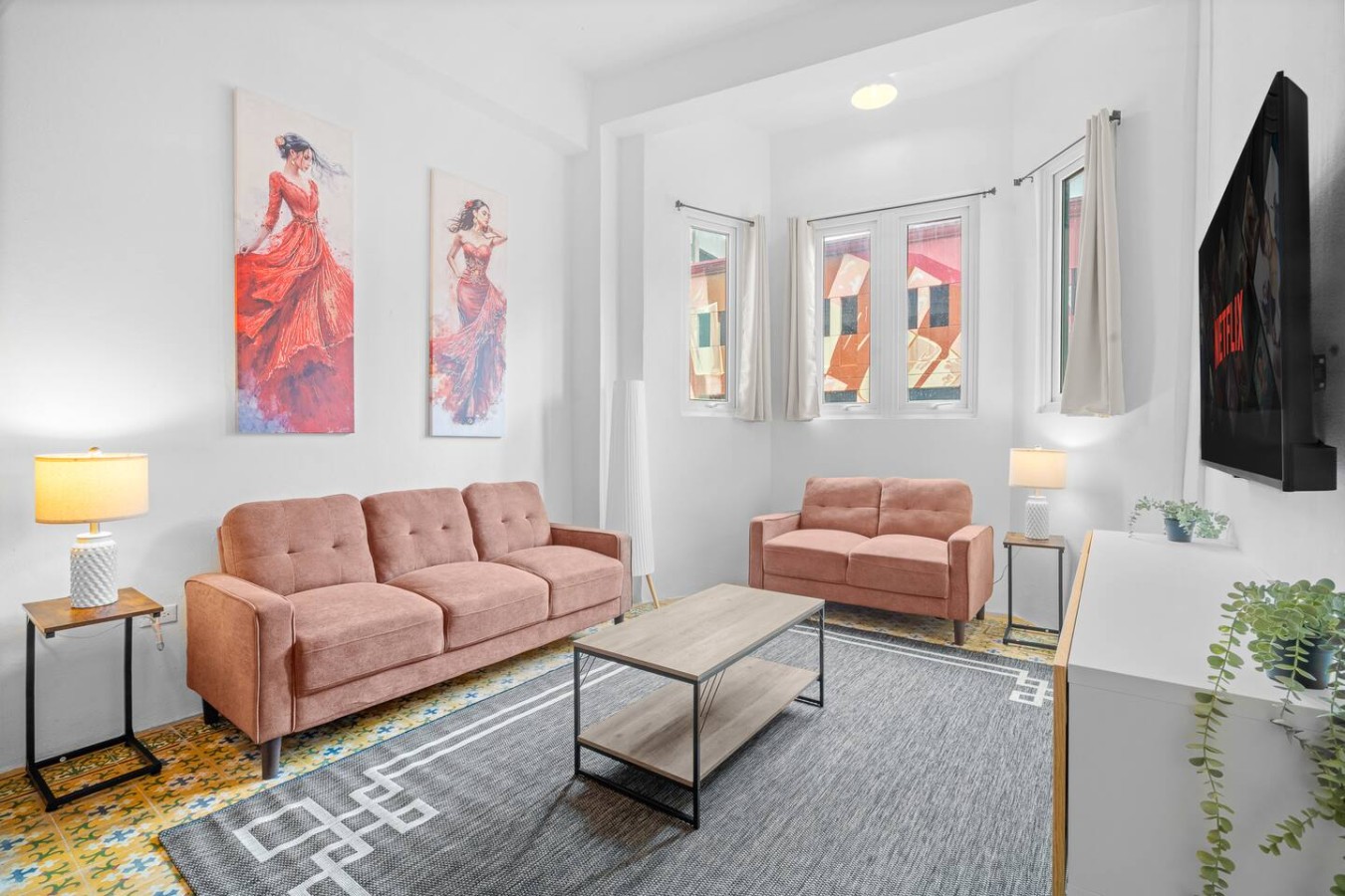 Living room with a couch and a painting on the wall — Bellavista Galleria | Old San Juan, Old San Juan