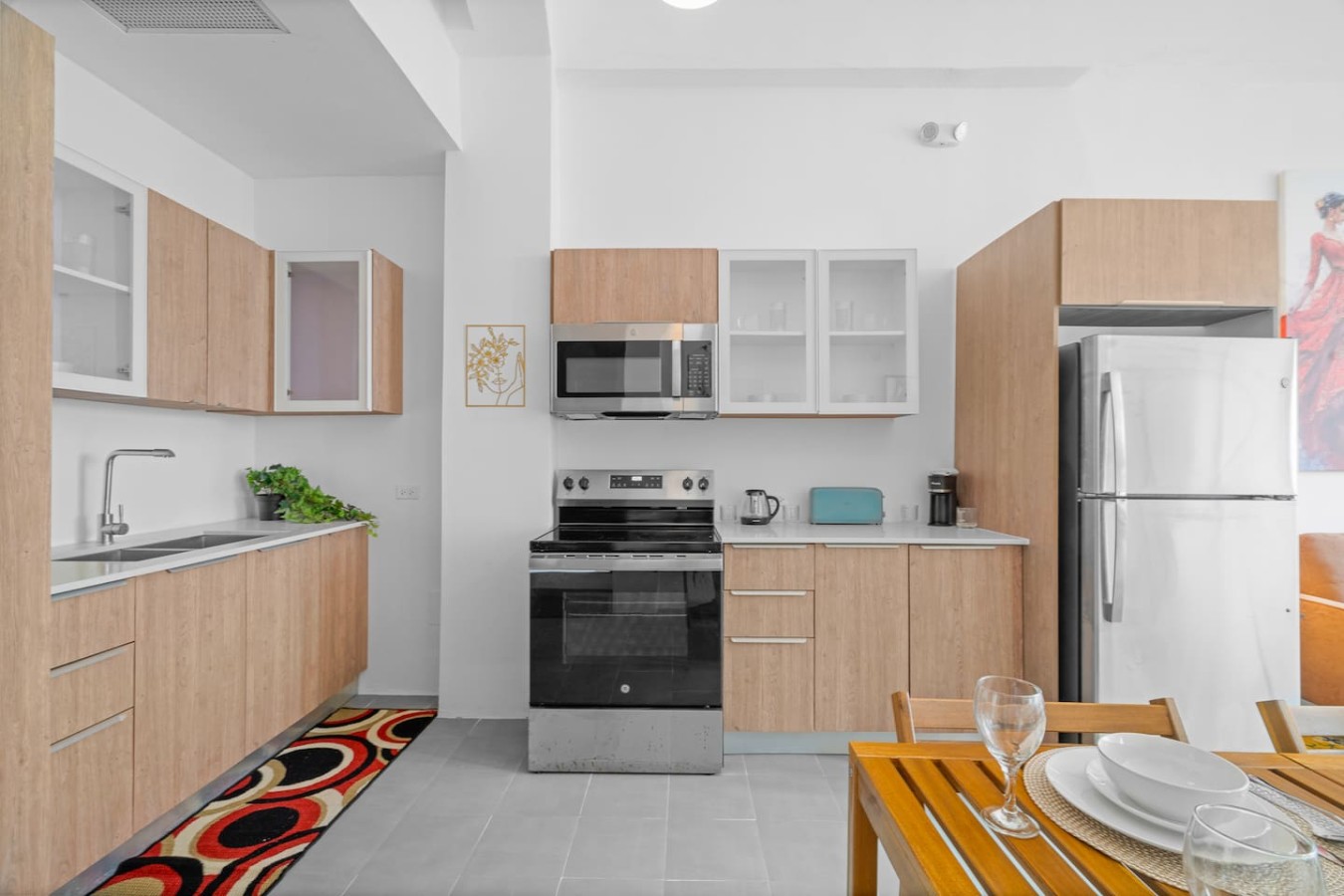 Kitchen with a stove and a microwave — Bellavista Galleria | Old San Juan