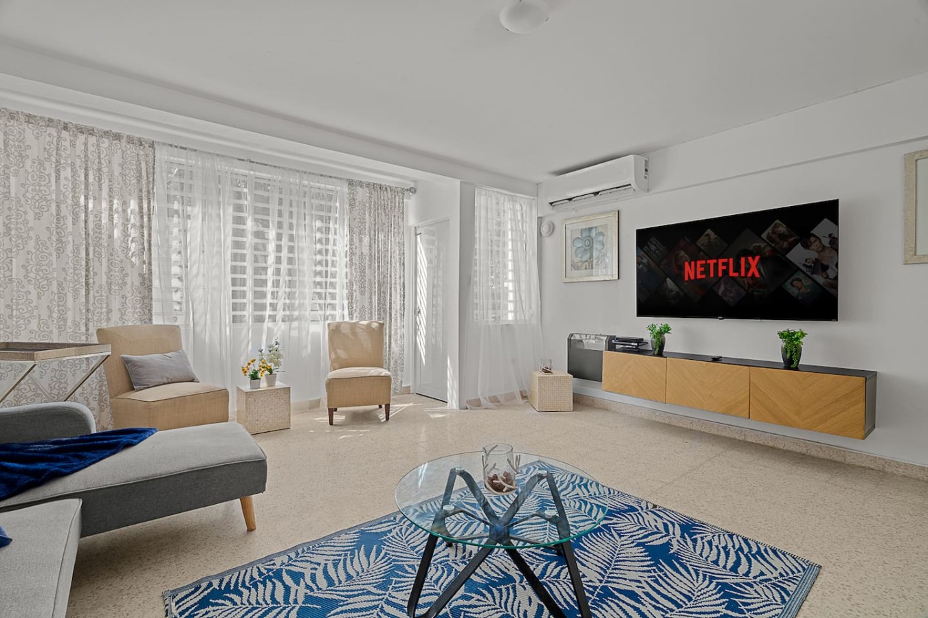 Living room with a flat screen TV and a couch — Ocean Park 2BR Backyard BBQ Walk to Beach, Santurce