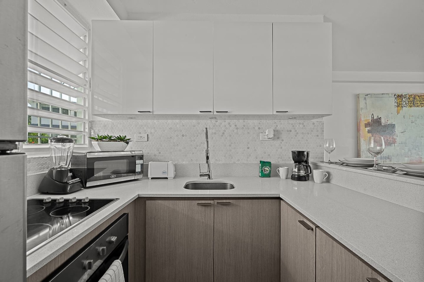 Kitchen with a cooktop, microwave and coffee maker — Ocean Park 2BR Backyard BBQ Walk to Beach, Santurce