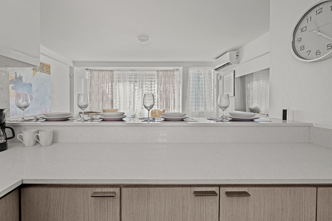 Dining area at a breakfast bar set for four — Ocean Park 2BR Backyard BBQ Walk to Beach, Santurce