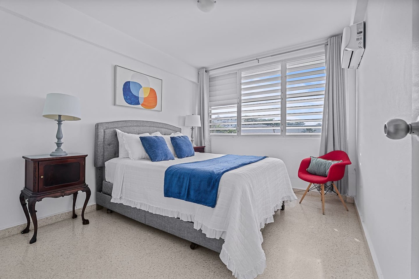 Bedroom with a blue blanket on the bed and a painting on the wall (bedroom 2) — Ocean Park 2BR · Steps to Beach & Dining, San