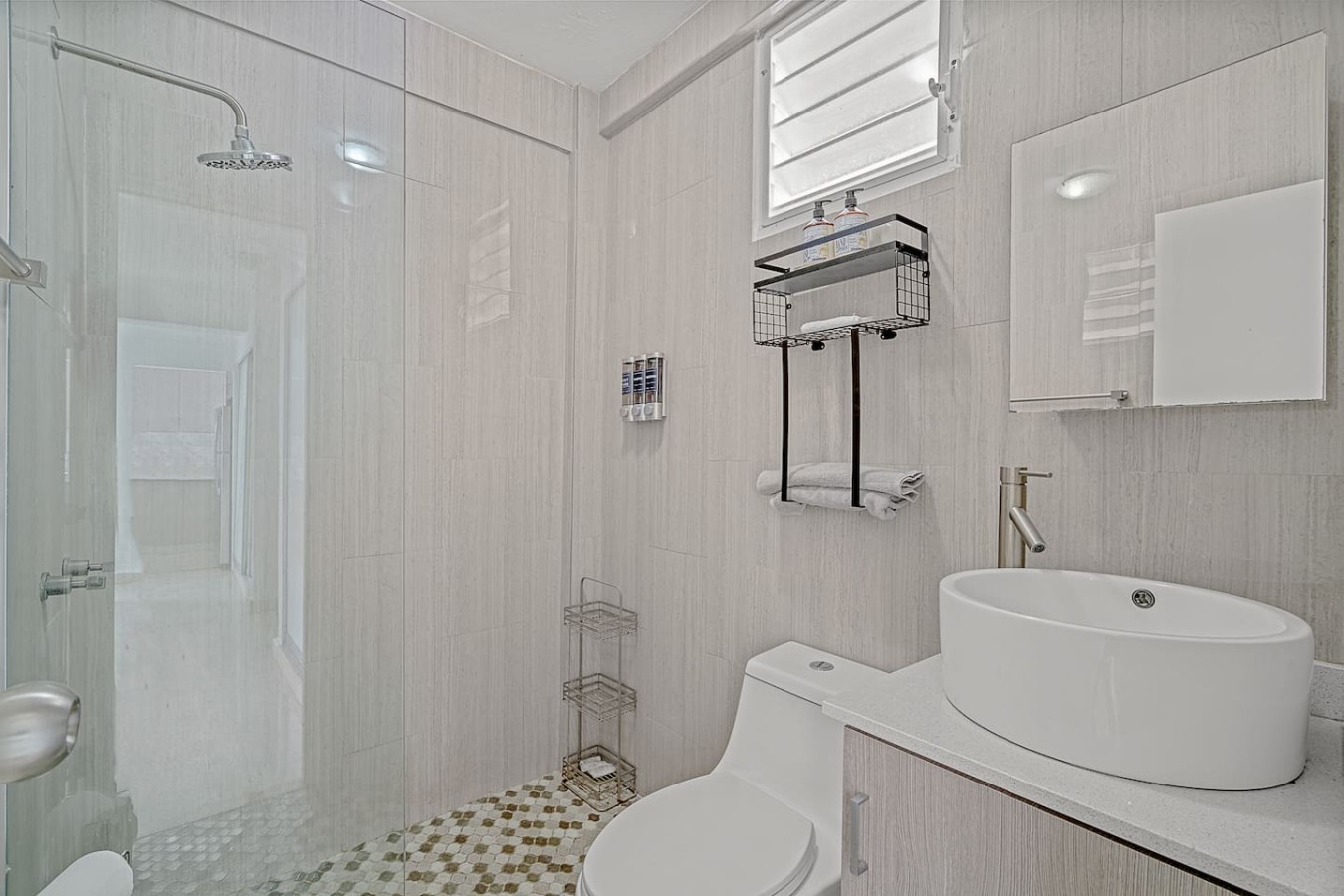 Bathroom with a glass shower and a vessel sink — Ocean Park 2BR · Steps to Beach & Dining, Santurce