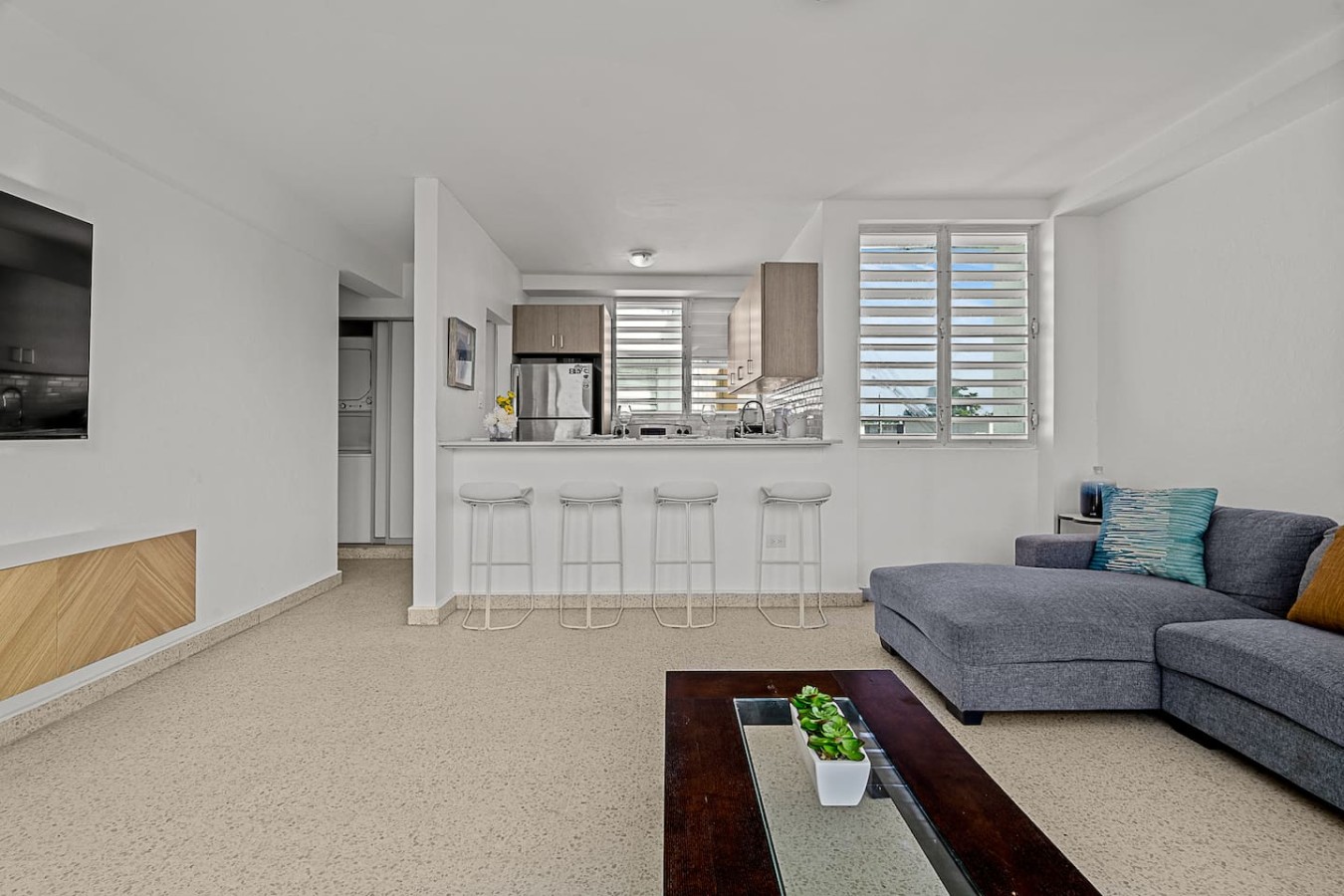 Kitchen with a refrigerator, microwave, and countertops — Ocean Park 2BR · Steps to Beach & Dining, Santurce