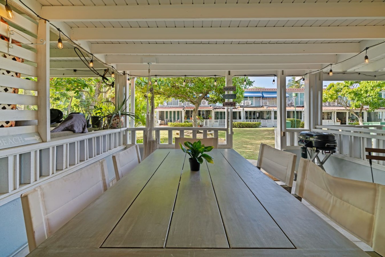 Table with a potted plant on it — Beachside Villa Dorado Pool Beach Access, Dorado