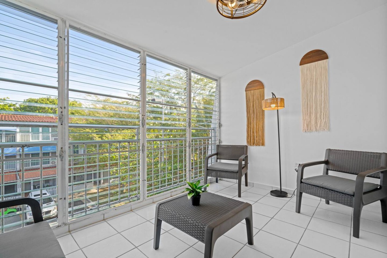 Balcony overlooking a city view — Beachside Villa Dorado Pool Beach Access, Dorado