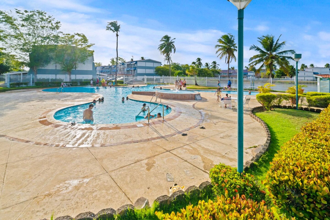 People swimming in a pool — Beachside Villa Dorado Pool Beach Access, Dorado