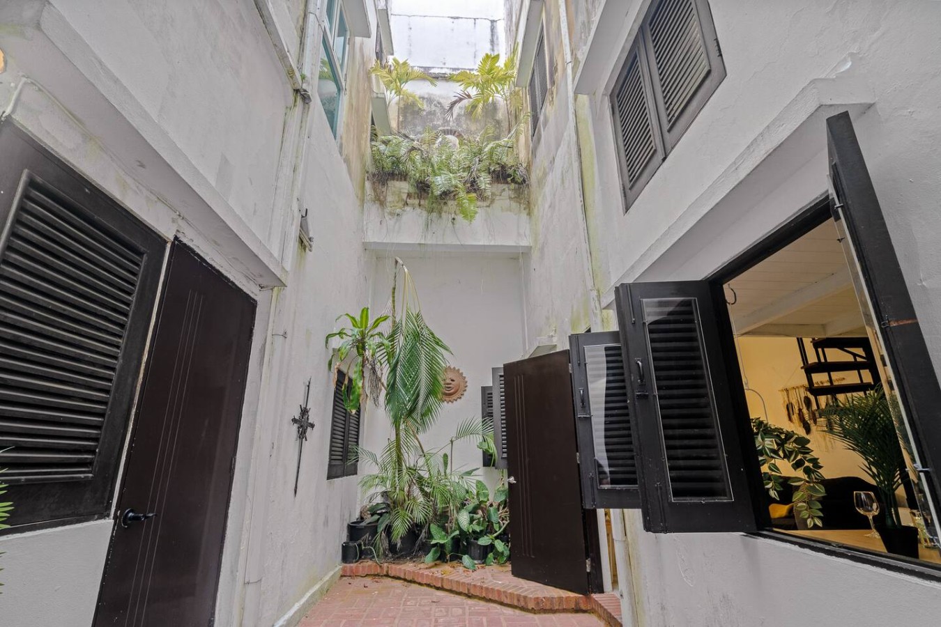 View of the outside of a building with a balcony — Historic Loft in the Heart of Old San Juan, Old San Juan