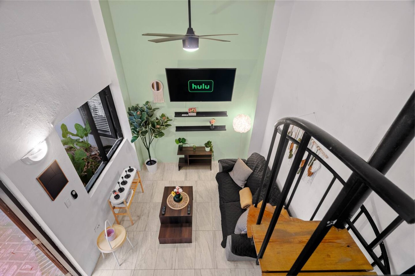 Living room with a couch and a TV — Historic Loft in the Heart of Old San Juan, Old San Juan