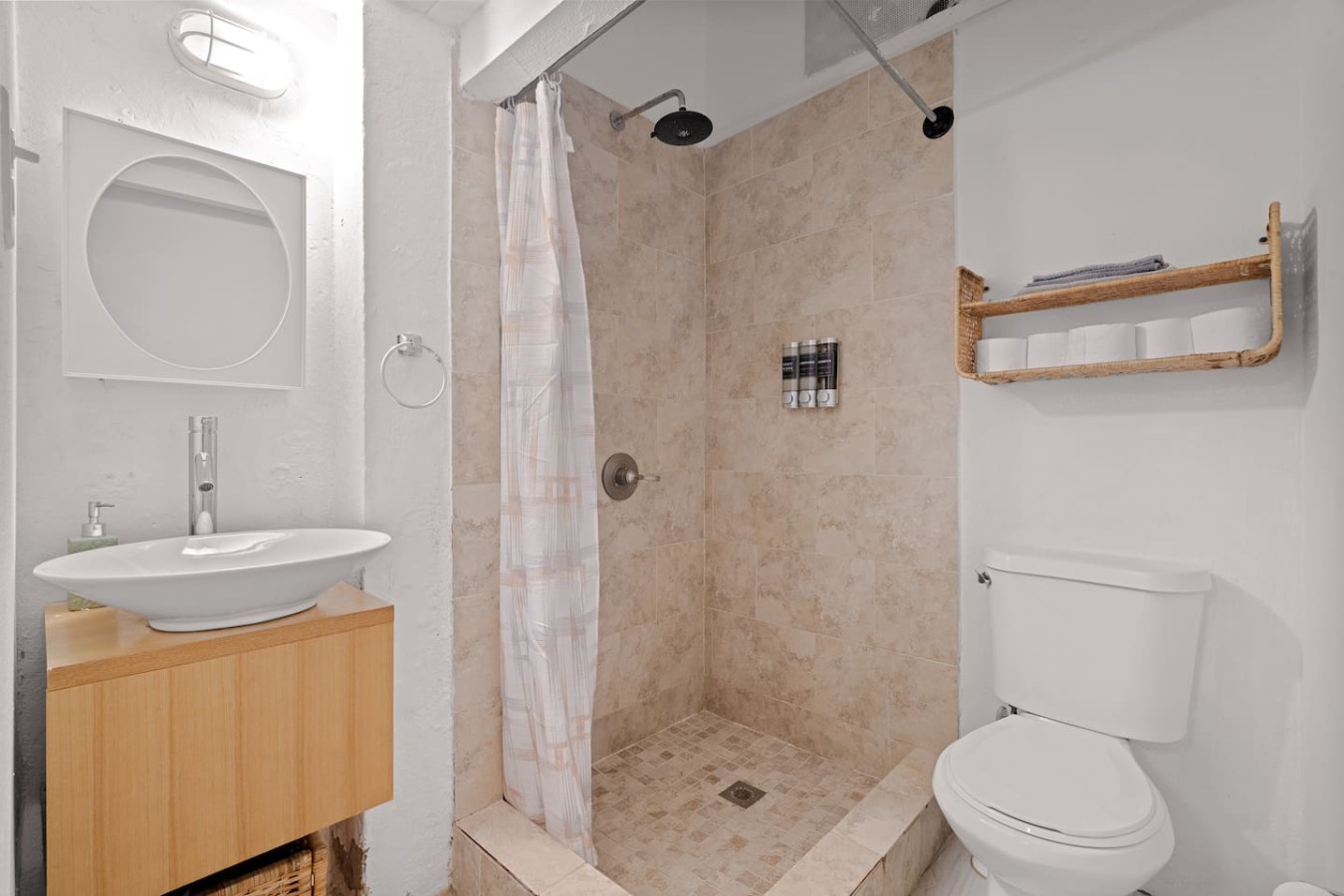 Bathroom with a shower and a toilet — Historic Loft in the Heart of Old San Juan