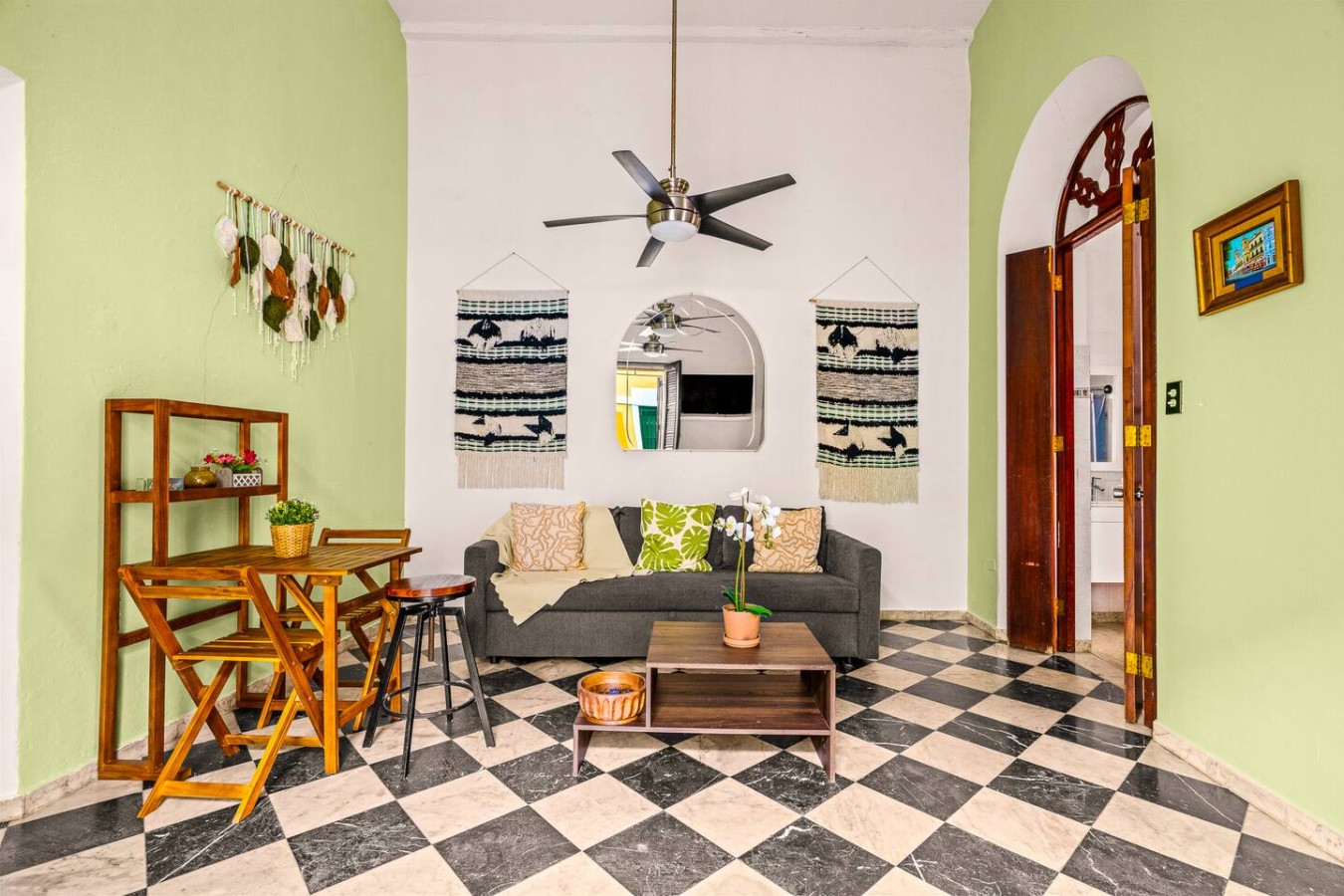 Living room with a couch, chairs, and a ceiling fan — 3B Imperial, Old San Juan