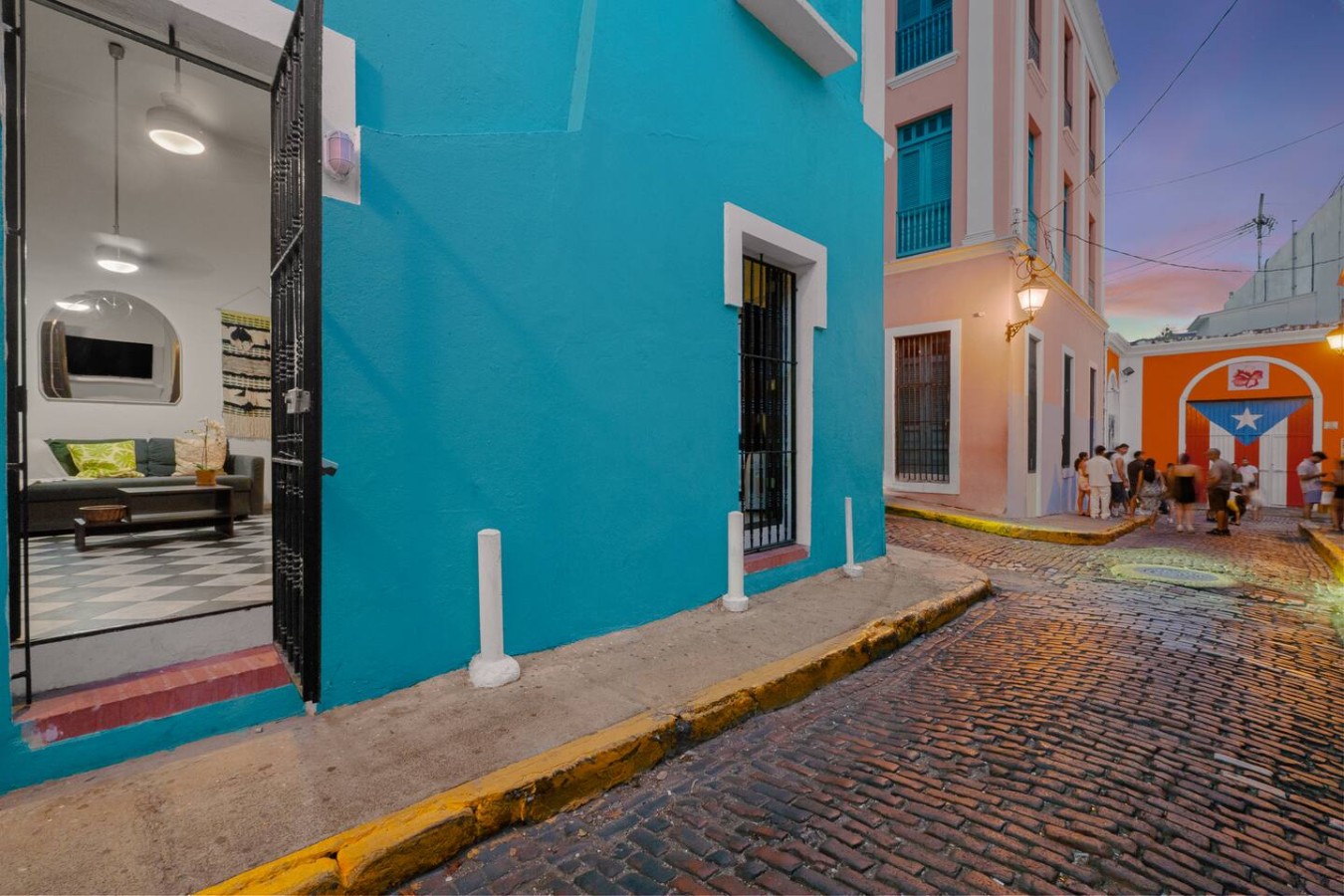 Blue building with a white door and a blue wall — 3B Imperial, Old San Juan