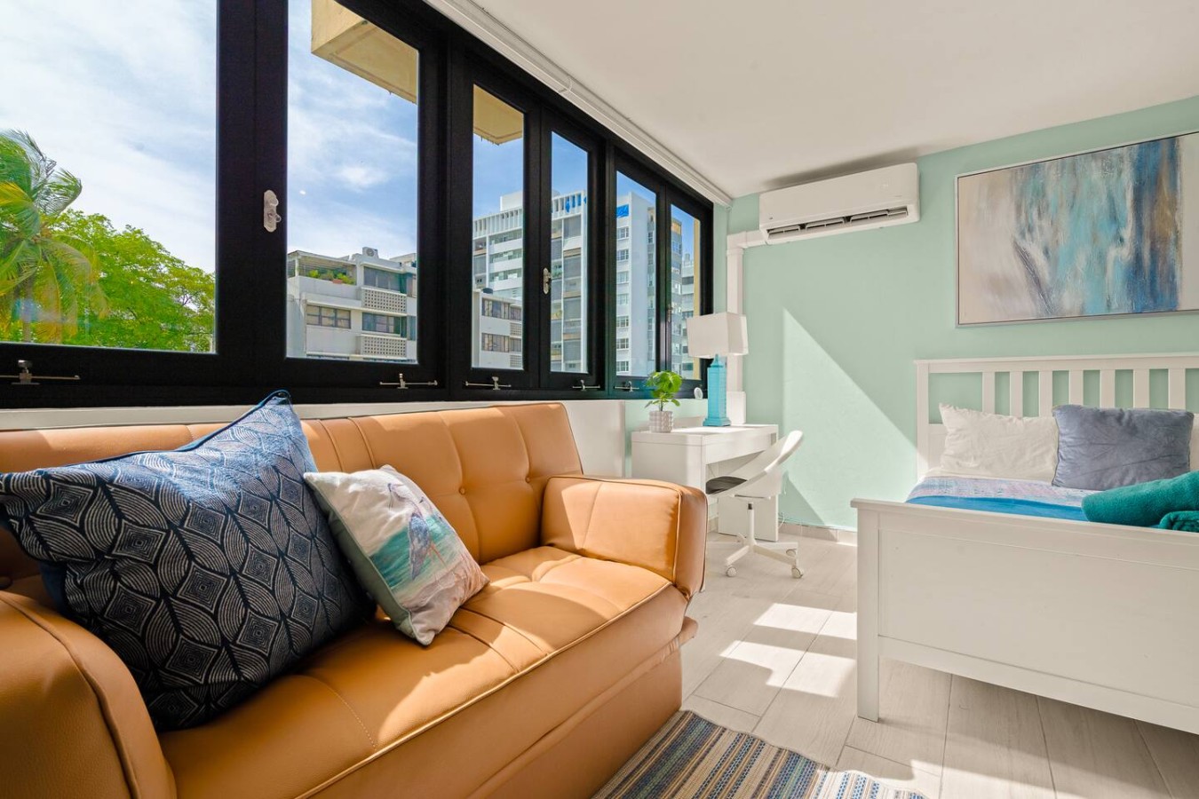 View of the ocean from the balcony of a vacation rental property (bedroom 2) — Casa Celeste | Sunlit Tropical Stay in Condado
