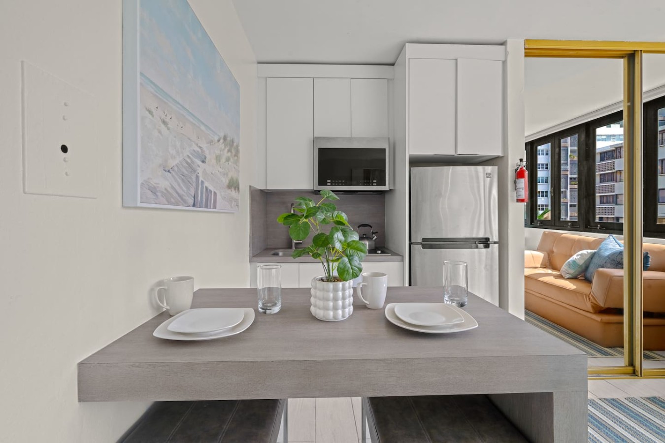 Kitchen with a dining table and chairs — Casa Celeste | Sunlit Tropical Stay in Condado, Santurce