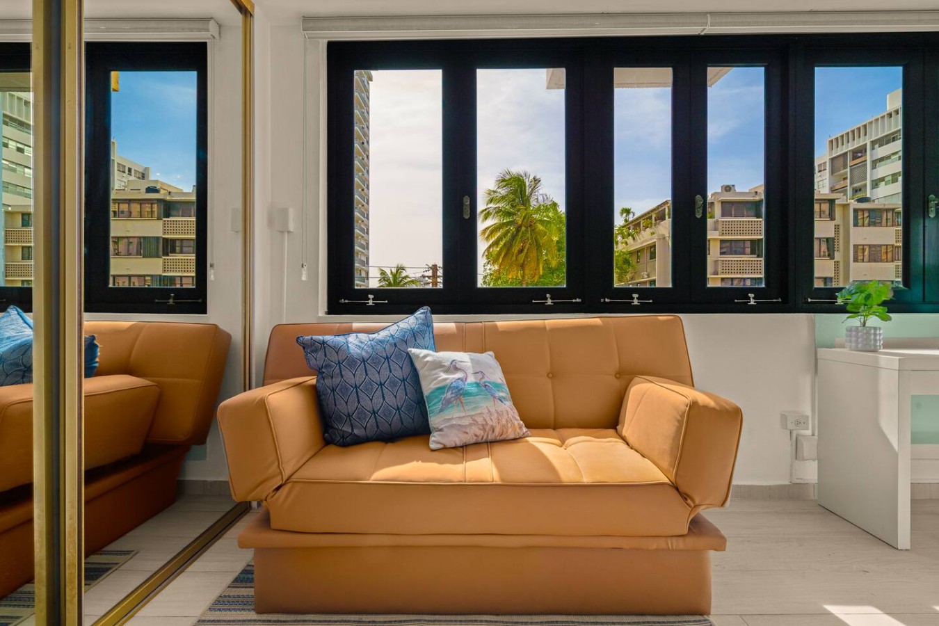 View of the ocean from the balcony of a vacation rental property — Casa Celeste | Sunlit Tropical Stay in Condado, Santurce