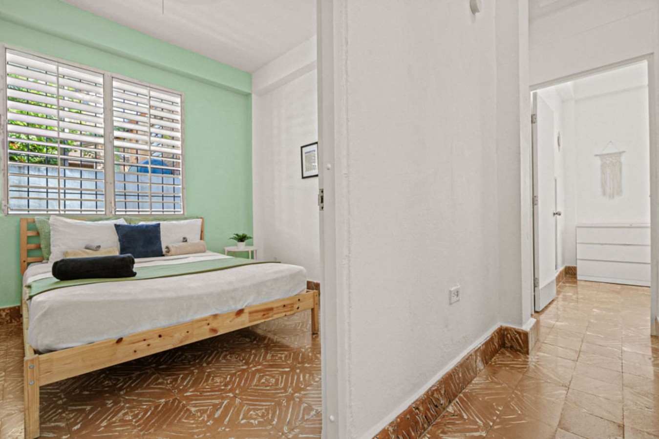 Bedroom with a bed and a window — Virelia | Colorful San Juan Escape for Four, Santurce