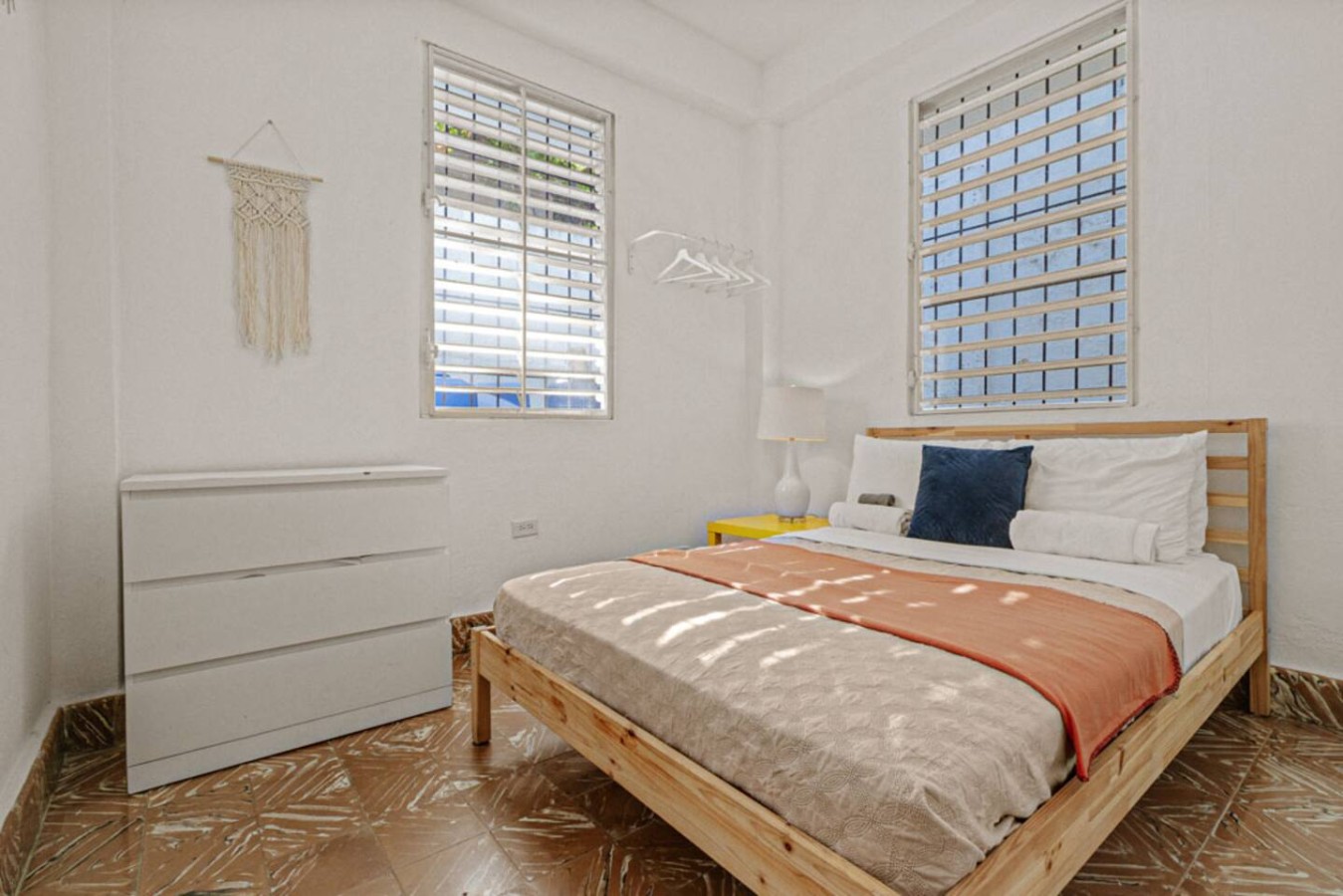 Bedroom with a bed and a lamp (bedroom 2) — Virelia | Colorful San Juan Escape for Four, Santurce