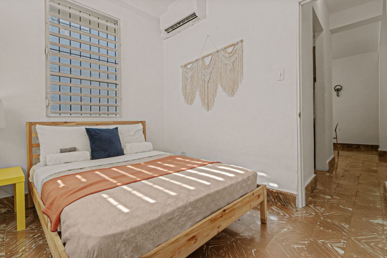 Bedroom with a bed and a view of the ocean — Virelia | Colorful San Juan Escape for Four, Santurce