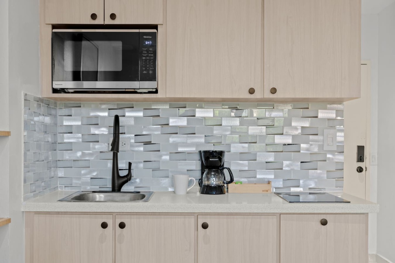 Kitchen with a microwave and a coffee maker (kitchen 2) — T-Mobile District San Juan Next to Beach, San Juan