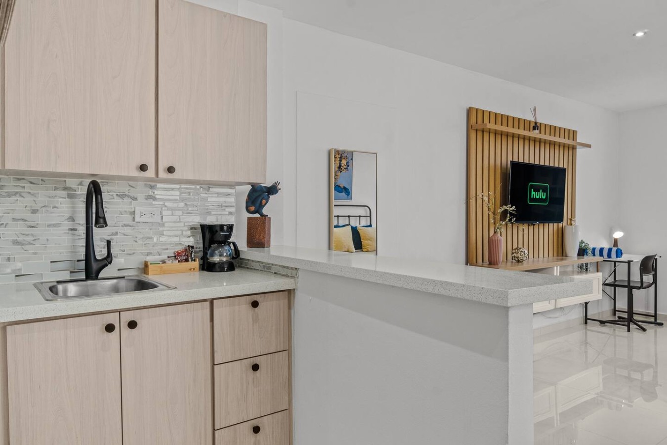 Kitchen with a counter and a sink — Caribbean Sea View | T-Mobile District Free Parking, San Juan