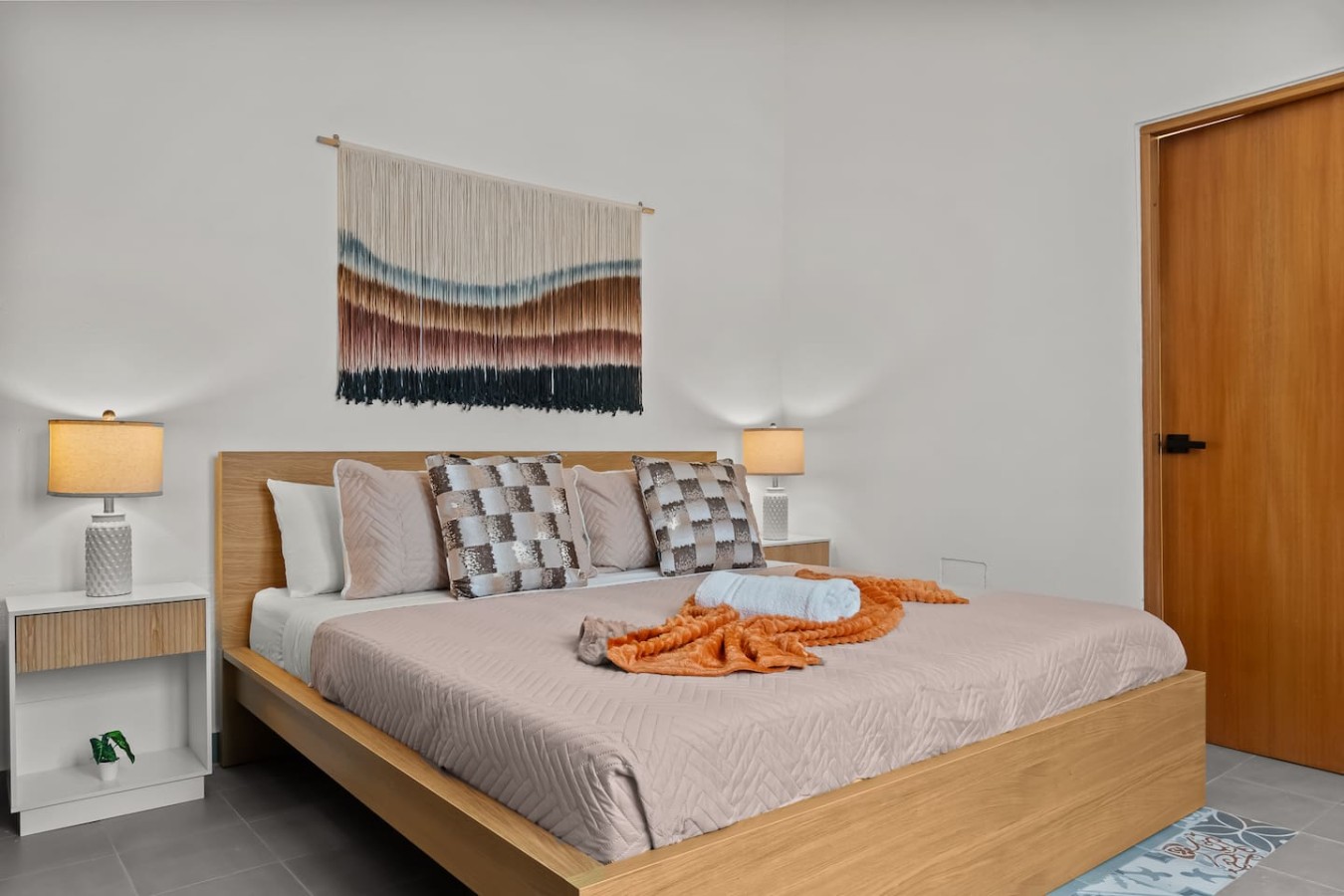 Bedroom with a bed and a hanging tapestry — Grand Galleria — Old San Juan Private Patio, Old San Juan