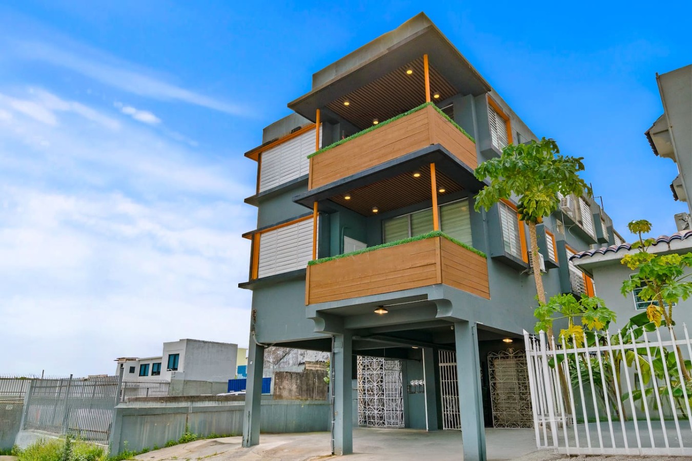 Large building with many windows and balconies — Santurce Blue 2BR | Near Beach & La Placita