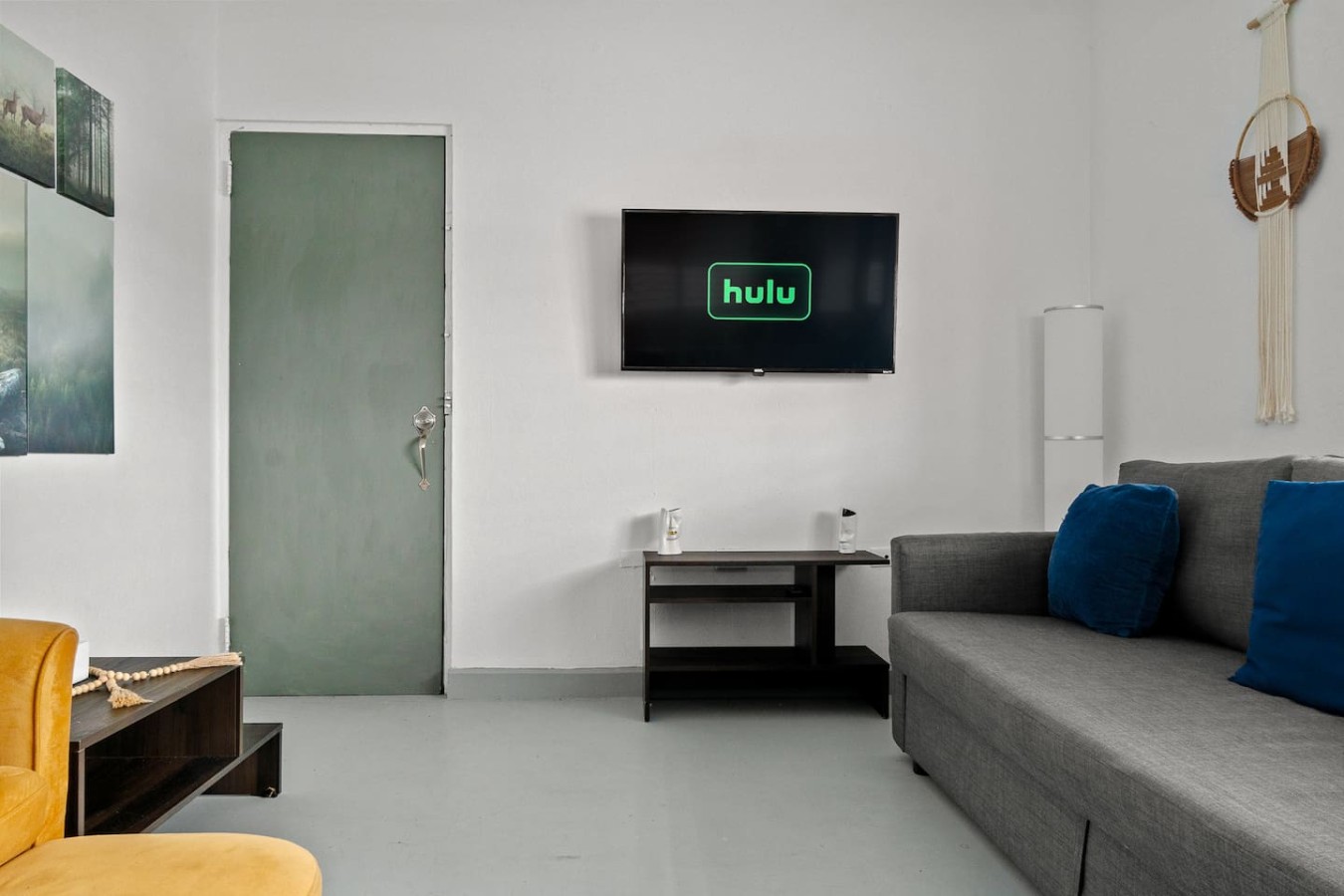 Green door in front of a building — Santurce Blue 2BR | Near Beach & La Placita