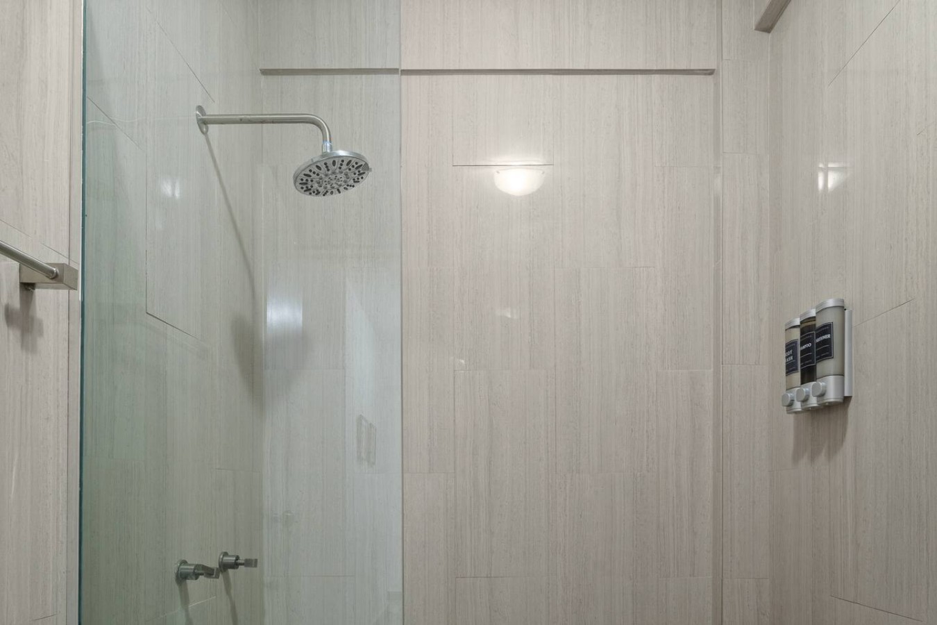 Shower with a shower head and a glass door — Maré 2BR | Near Ocean Park Beach + Laundry, Santurce