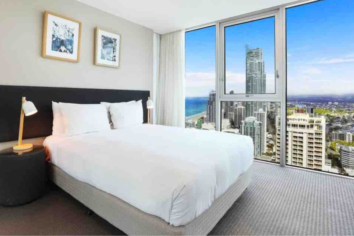 Experience ultimate comfort and stunning city views from your bedroom.