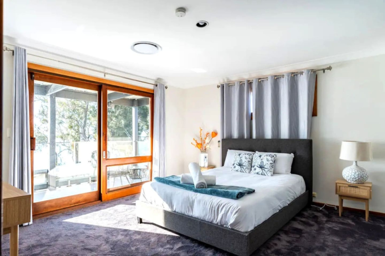 Relax with a scenic view from your bedroom's large window.